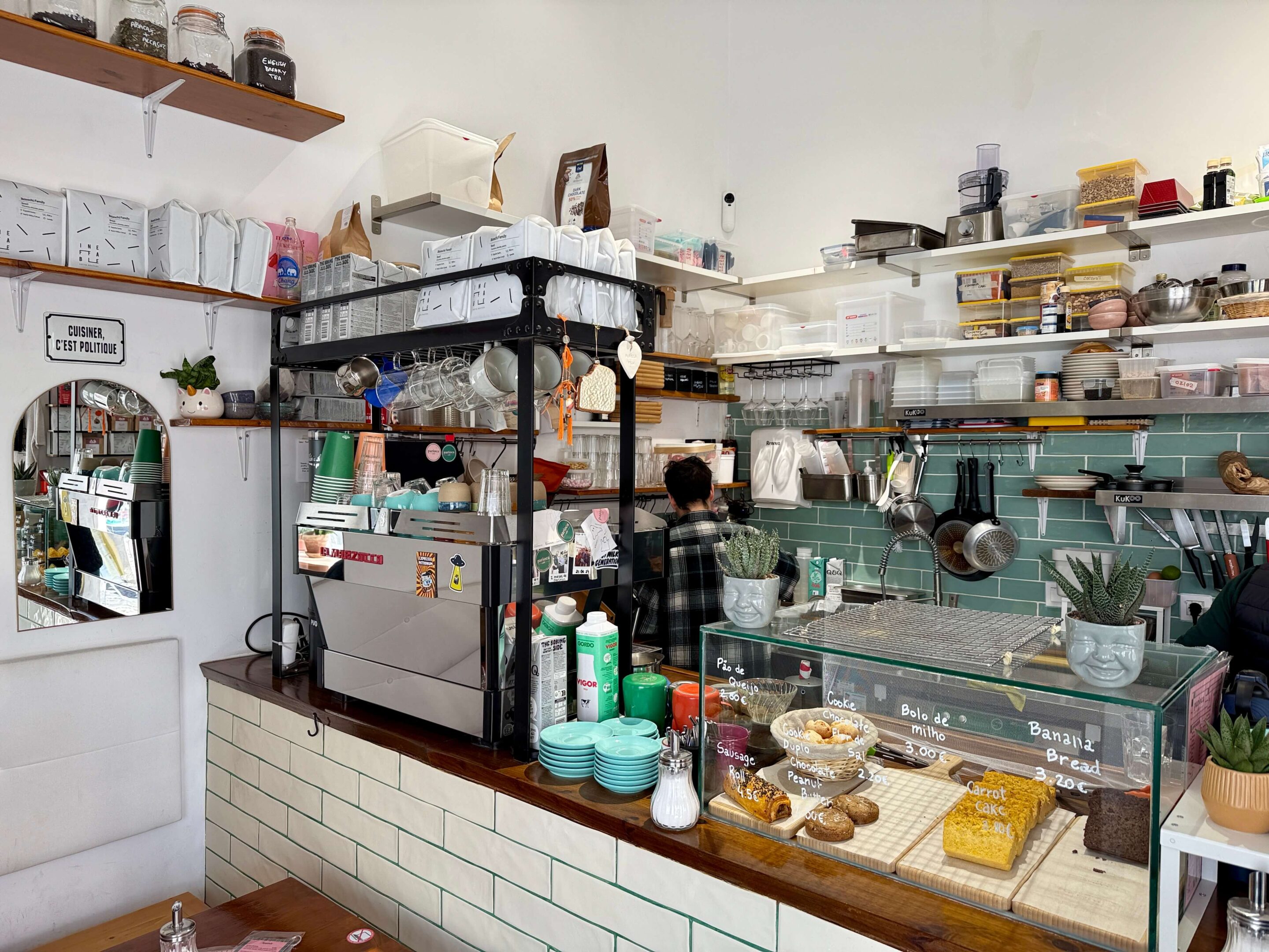 A tartine with house-made olive oil on the marble counter at Parioca Café